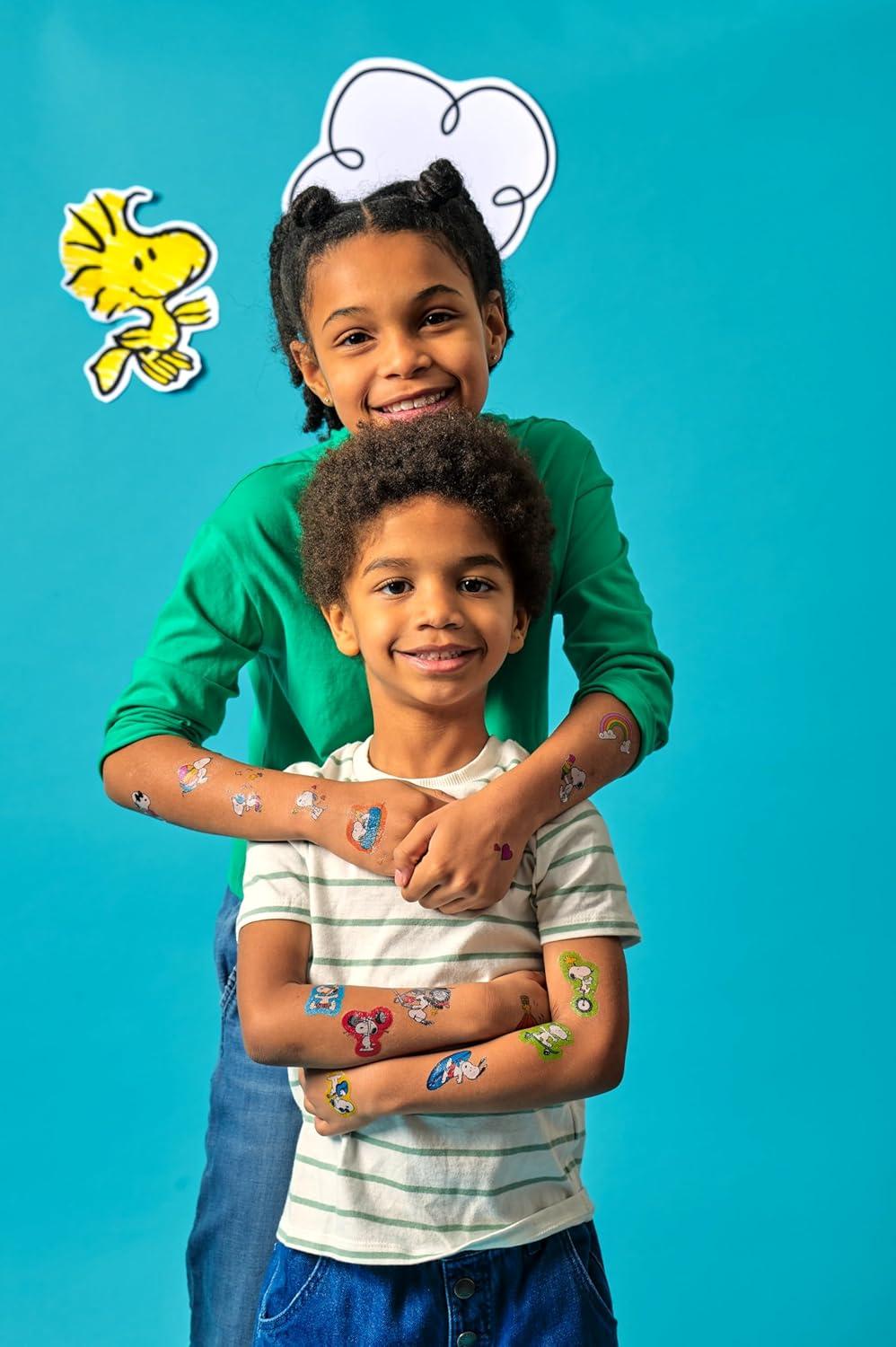 image:imageOoly 50 Glitter Temporary Tattoos For Kids Safe amp NonToxic Temporary Tattoo Party Favors Gifts for Kids Great Goodie Bag Stuffers amp Fun Birthday Decorations Doodle WorldPeanuts Snoopy